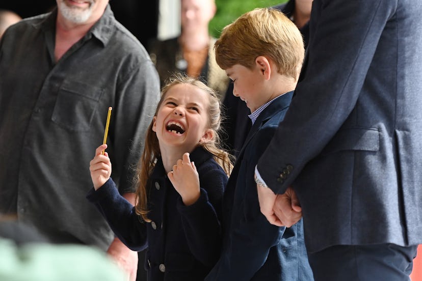 Prince William cracks his daughter up.