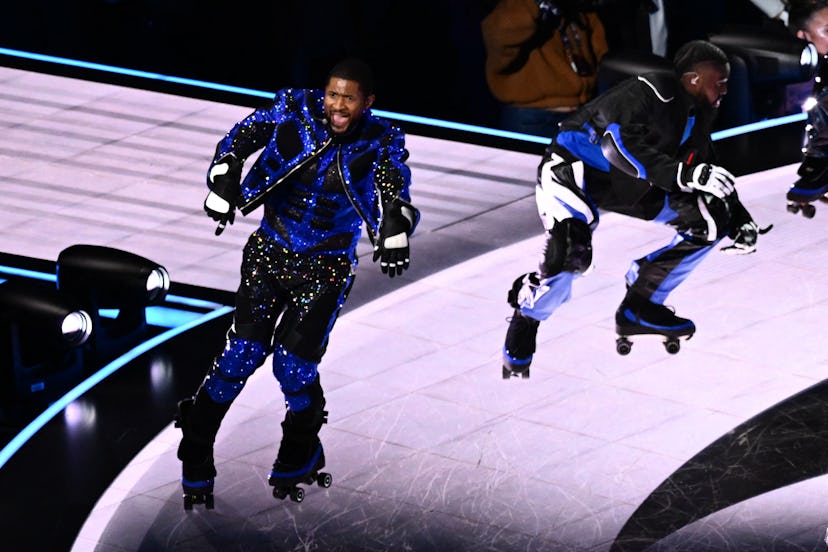 Usher at the Super Bowl halftime show. Photo via Getty Images