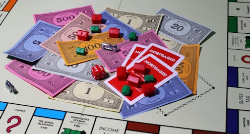 General view of money on a Monopoly Board. (Photo by Lynne Cameron/PA Images via Getty Images)