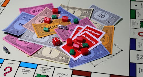 General view of money on a Monopoly Board.   (Photo by Lynne Cameron/PA Images via Getty Images)