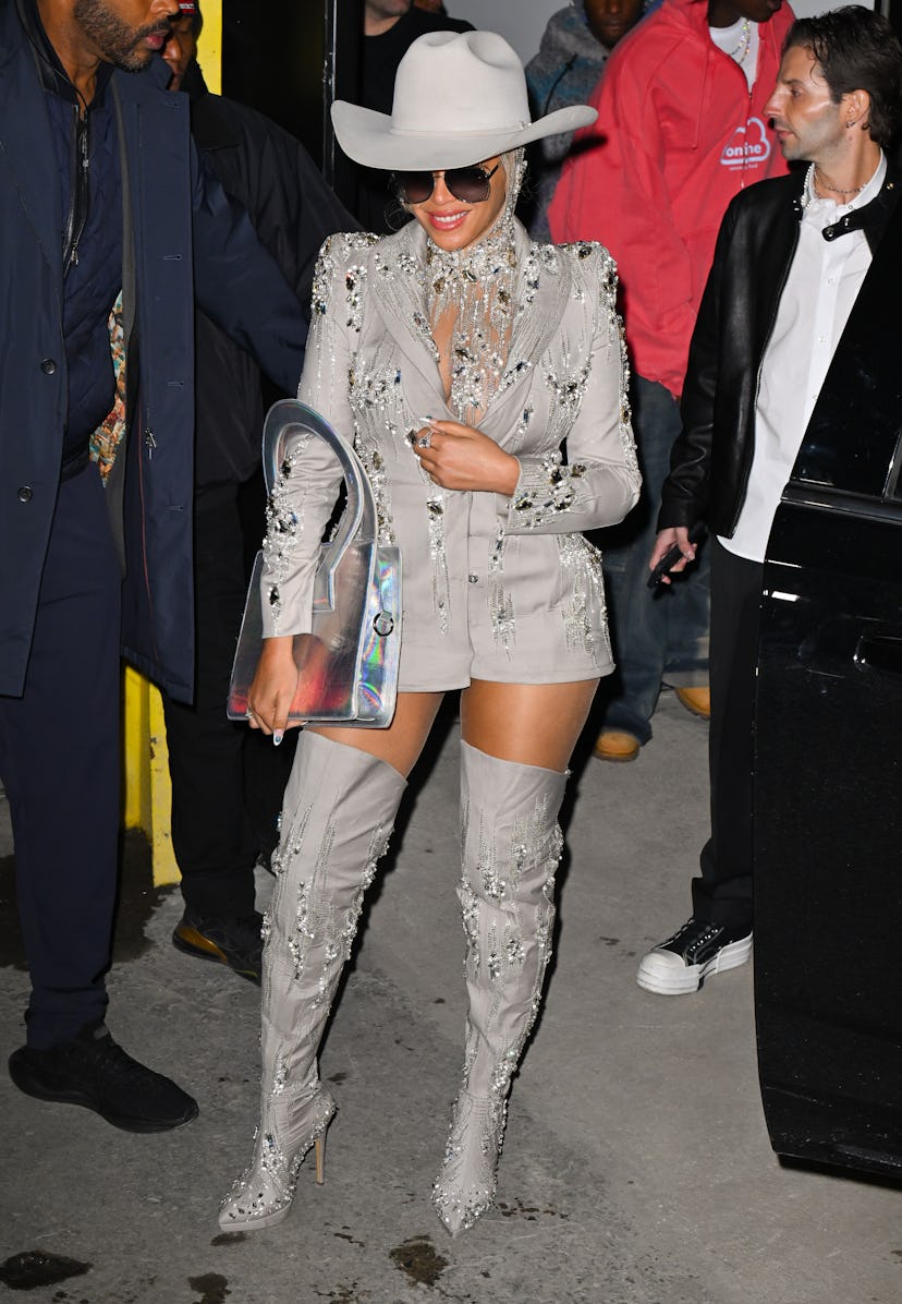 Beyoncé leaves the Luar fashion show in a bedazzled blazer dress and a cowboy hat during New York Fa...