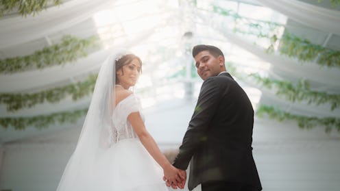 A portrait of a bride and a groom.