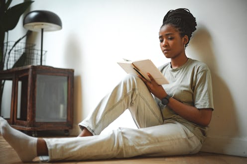 young woman reading a book