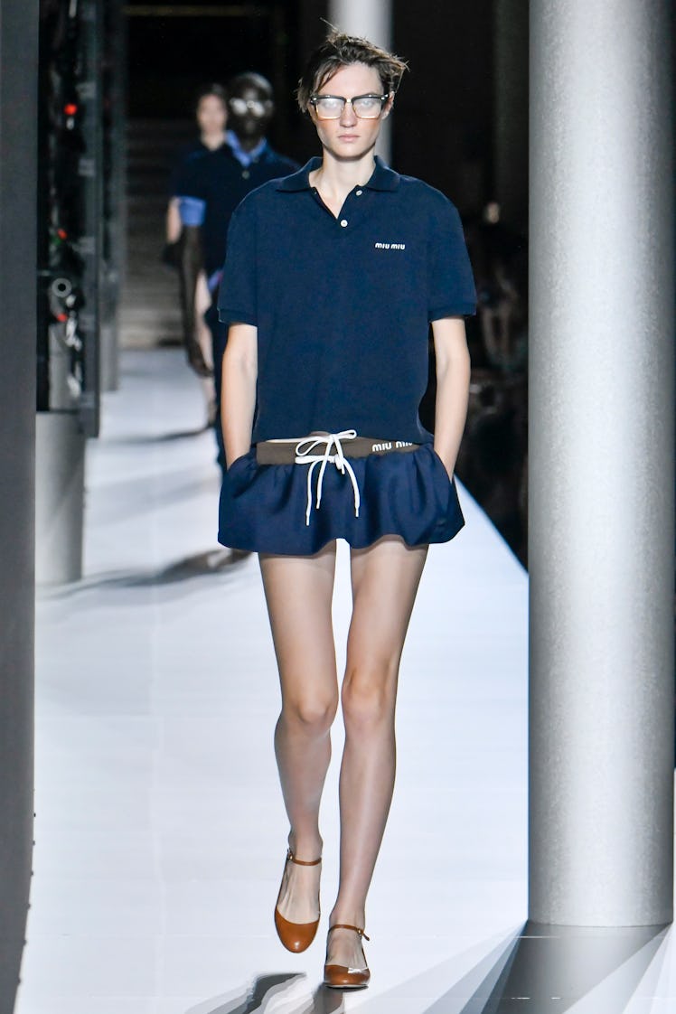 PARIS, FRANCE - OCTOBER 03: A model walks the runway during the Miu Miu Ready to Wear Spring/Summer ...