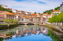 Ondarroa skyline by Artibai river and bridge Latxambre in Biscay Basque Country of Spain