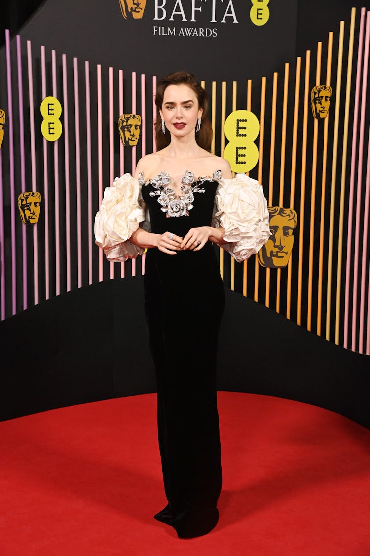 LONDON, ENGLAND - FEBRUARY 18: Lily Collins attends the 2024 EE BAFTA Film Awards at The Royal Festi...
