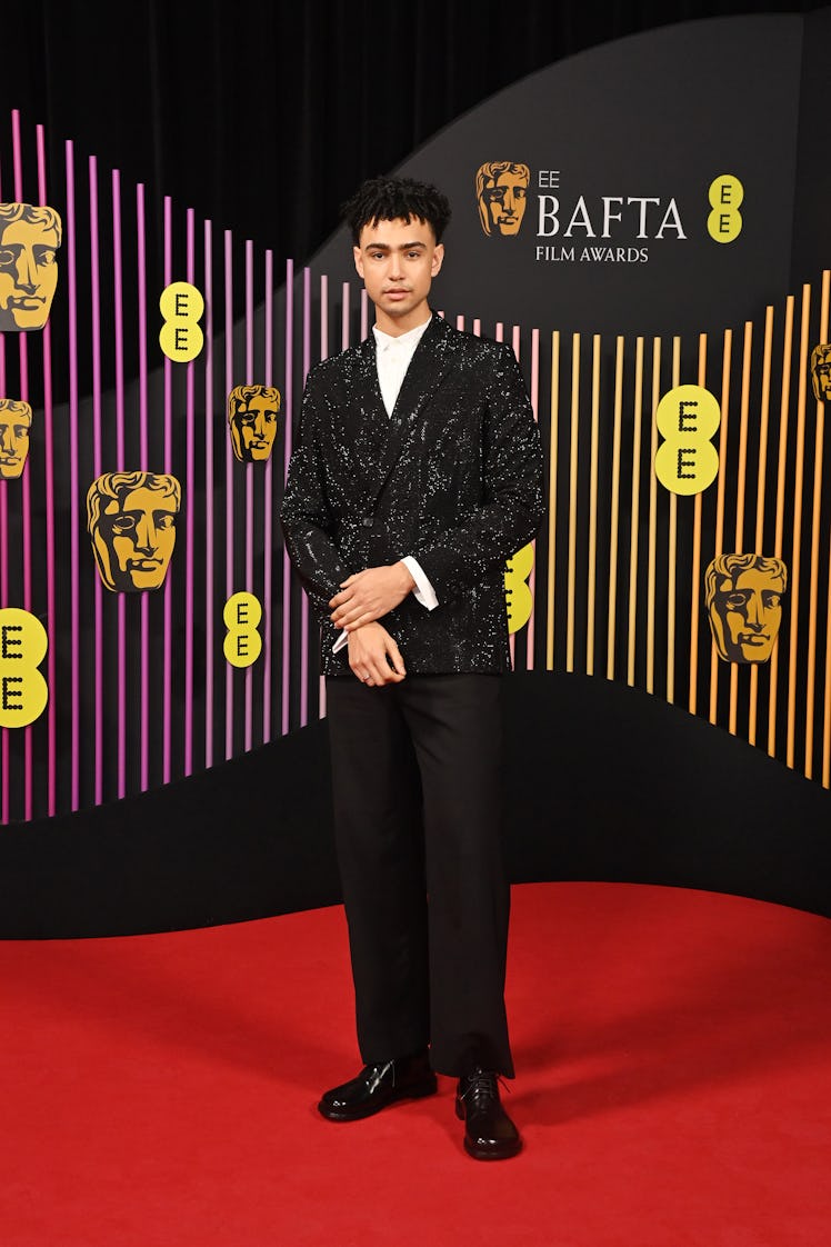 LONDON, ENGLAND - FEBRUARY 18: Archie Madekwe attends the 2024 EE BAFTA Film Awards at The Royal Fes...