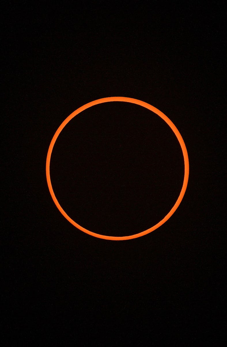 ALBUQUERQUE, NEW MEXICO - OCTOBER 14: The moon completely crosses in front of the sun during the An...