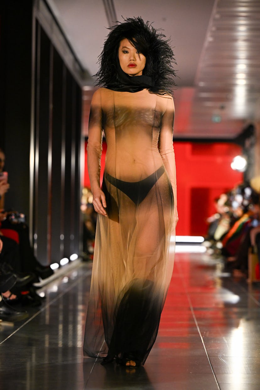 A model walks the runway at the FROLOV show during London Fashion Week.