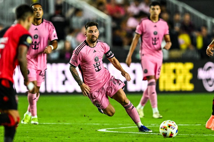 TOPSHOT - Inter Miami's Argentine forward #10 Lionel Messi plays during the international friendly m...