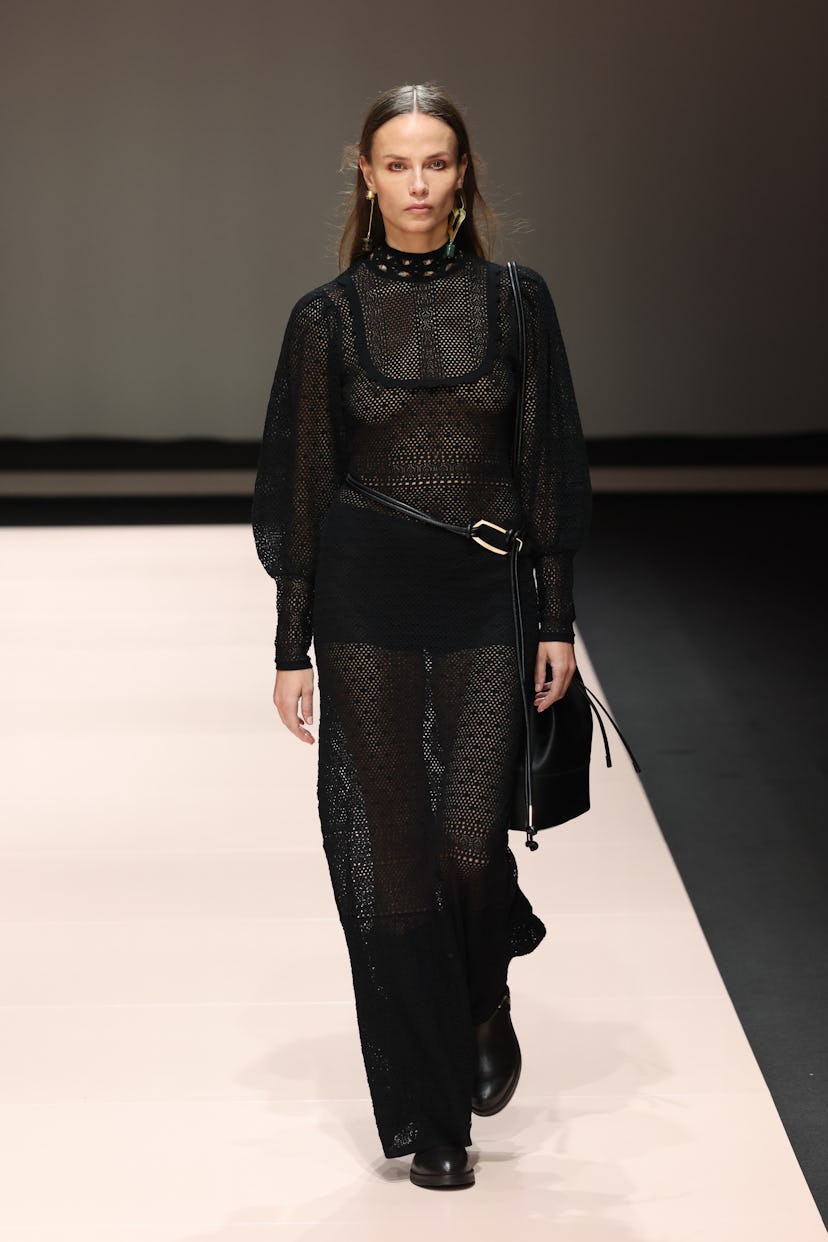 Natasha Poly walks the runway at the Twinset Fashion Show during Milan Fashion Week. 