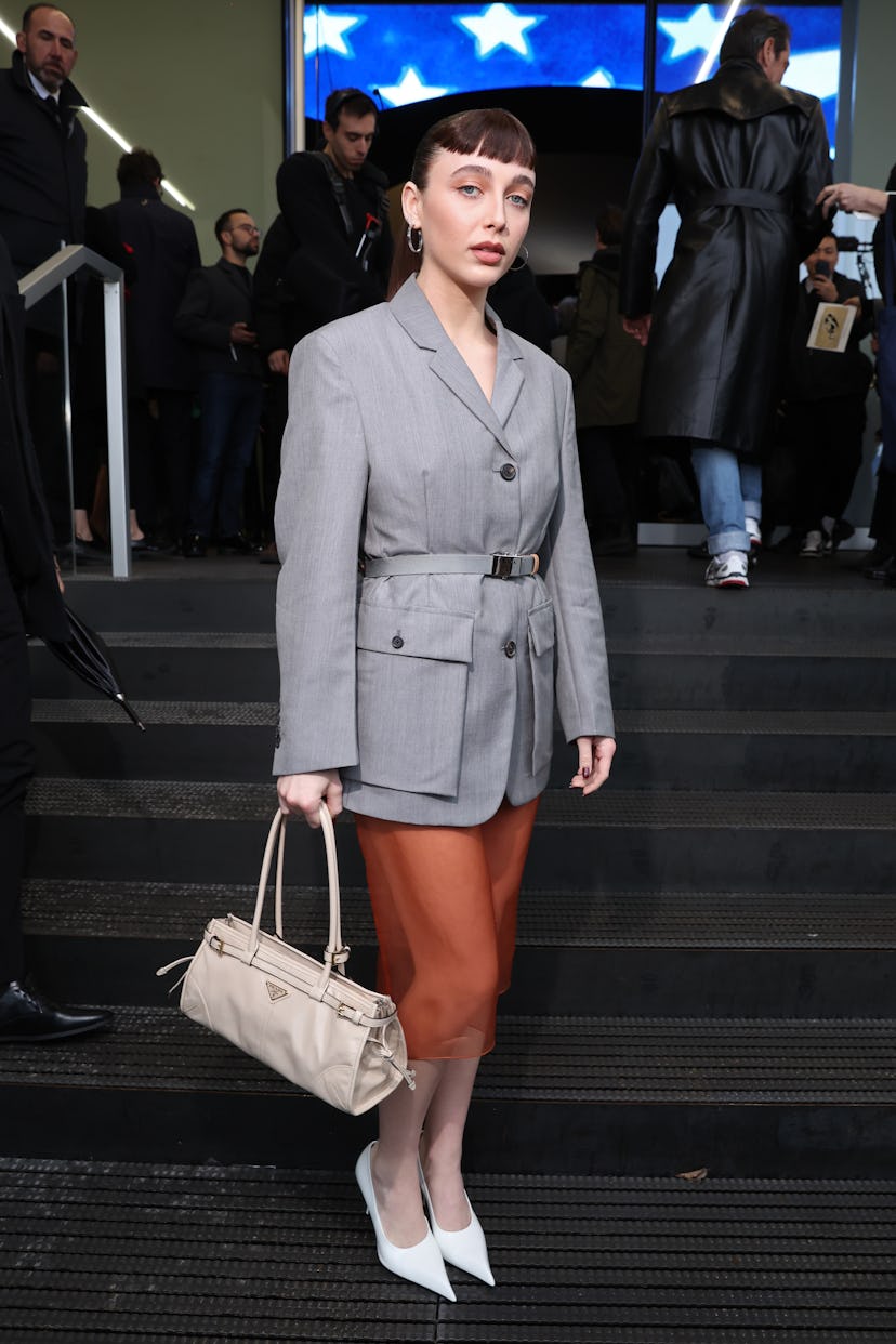MILAN, ITALY - FEBRUARY 22: Emma Chamberlain is seen arriving at the Prada fashion show during the M...