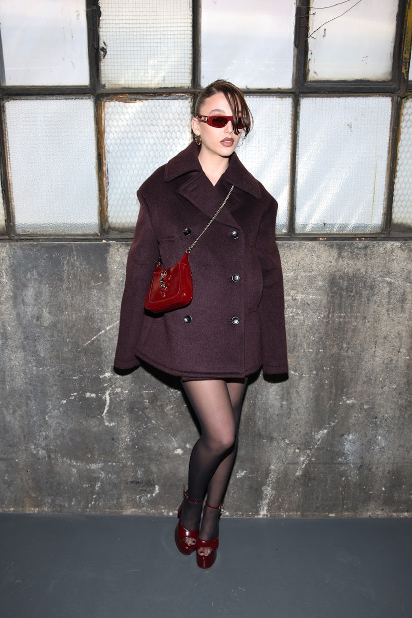 MILAN, ITALY - FEBRUARY 23: Emma Chamberlain attends the Gucci Women's Fall Winter 2024 Fashion Show...