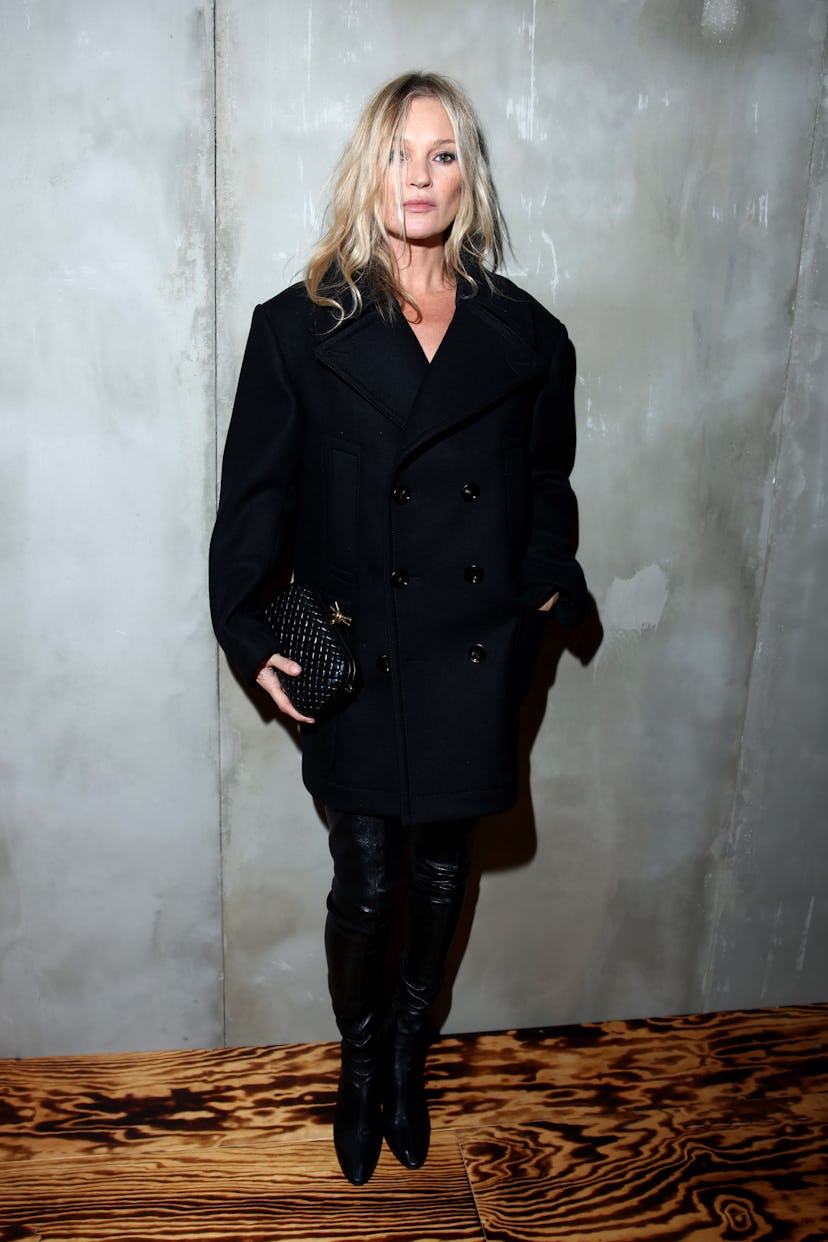 MILAN, ITALY - FEBRUARY 24: Kate Moss attends the Bottega Veneta fashion show during the Milan Fashi...