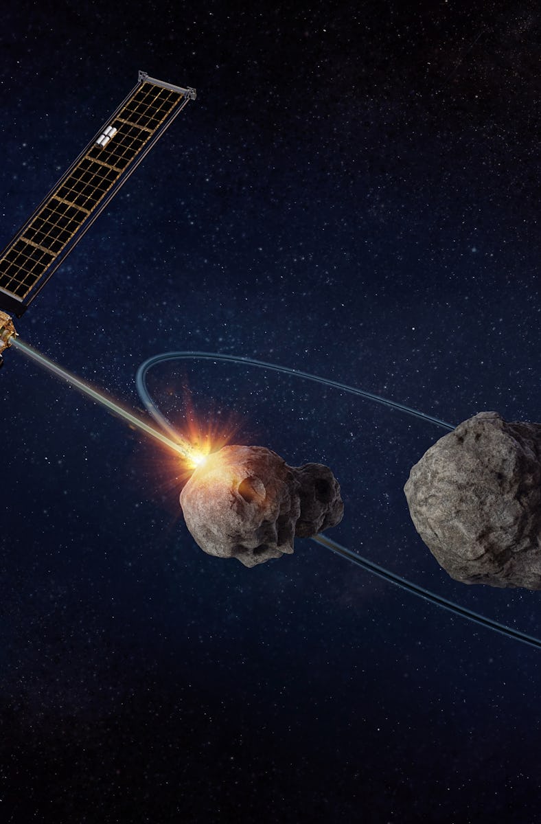 Artist rendering of the NASA Double Asteroid Redirection Test (DART) space probe approaching the ast...