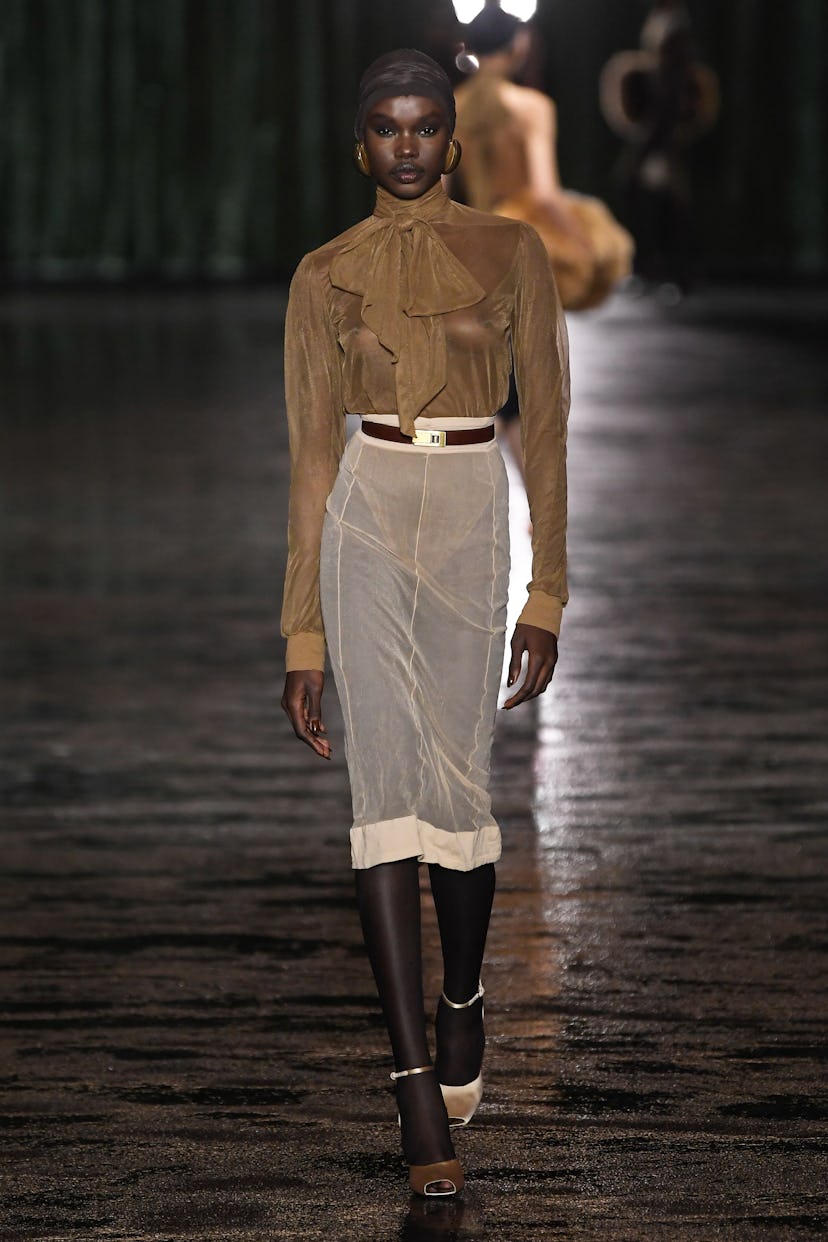 Model on the runway at Saint Laurent RTW Fall 2024 as part of Paris Ready to Wear Fashion Week.