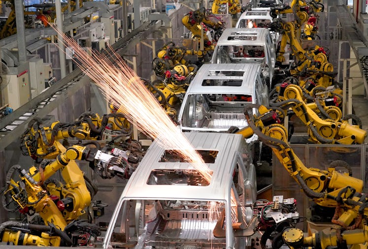 WUHAN, CHINA - AUGUST 23: Automated robotic arms work on the assembly line of Voyah electric vehicle...