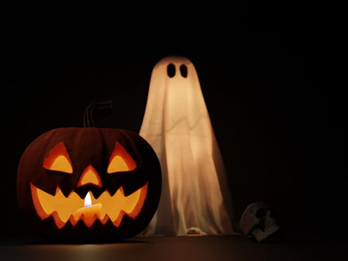 Halloween pumpkin, Jack O' Lantern glowing in darkness