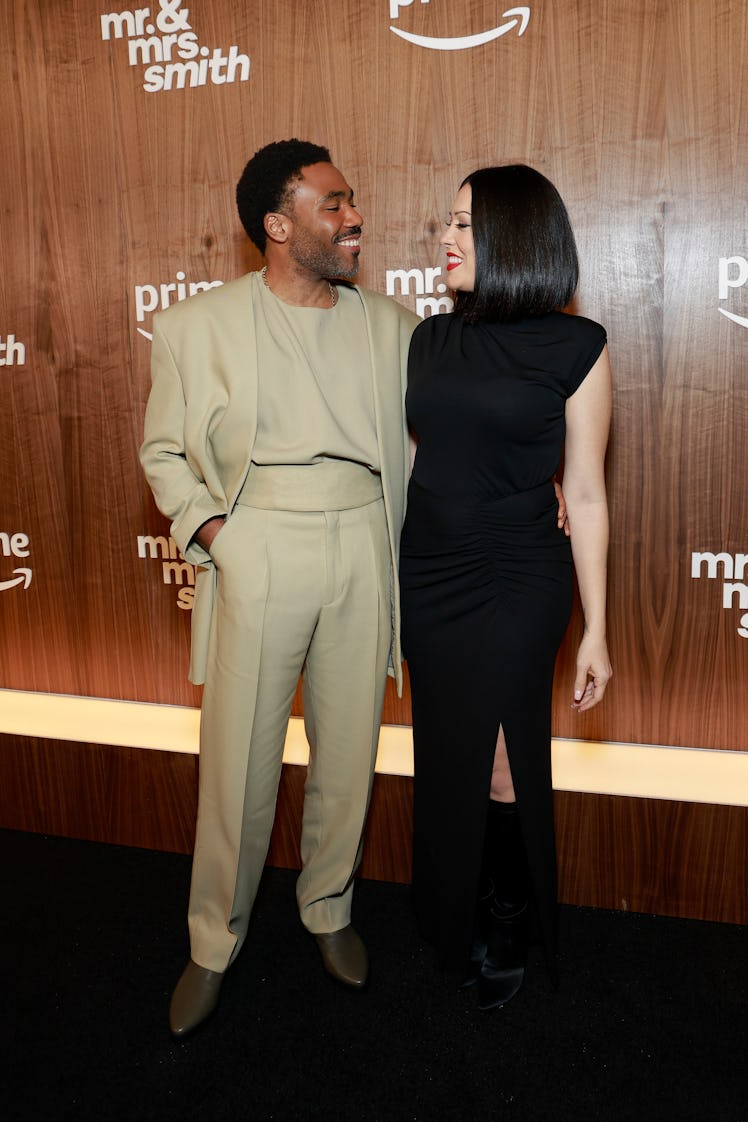 Donald Glover and Michelle White attend the "Mr. & Mrs. Smith" red carpet premiere at The Weylin on ...