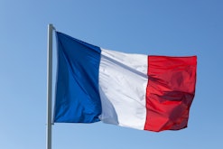 French national flag with blue sky
