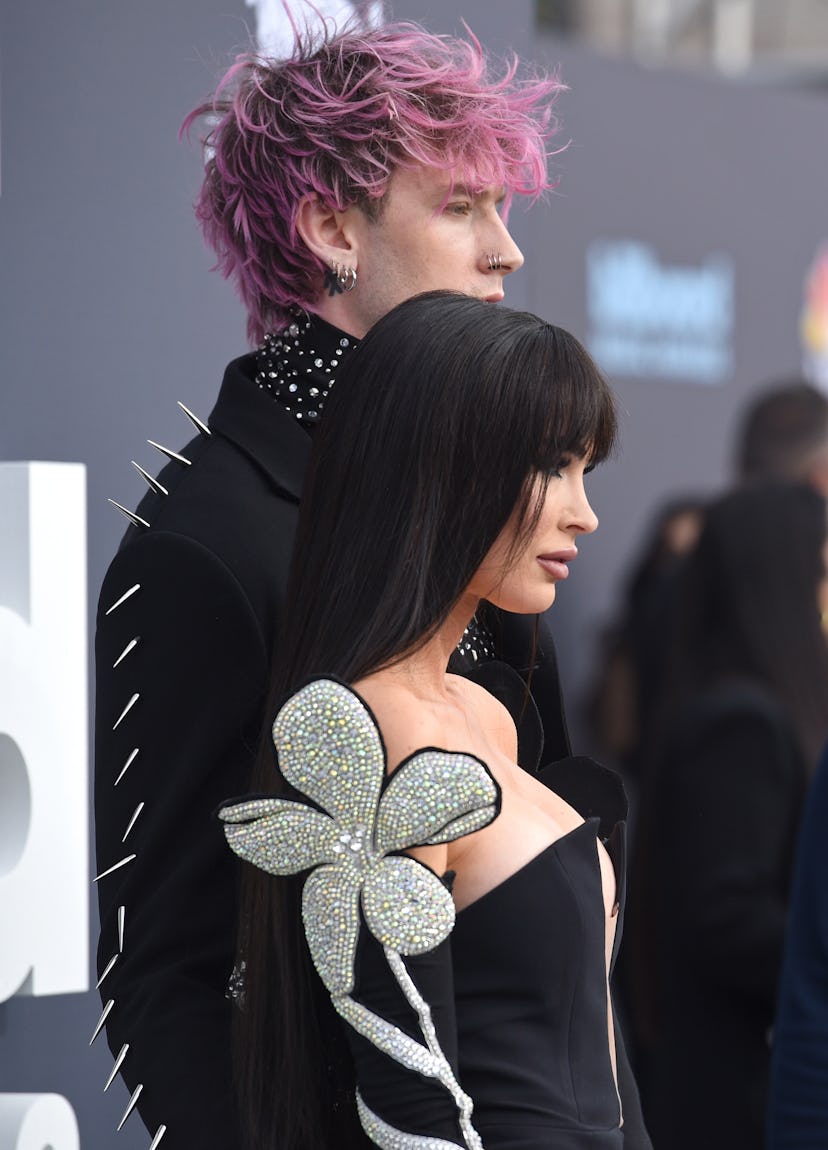 Megan Fox's new pink hair is reminiscent of Machine Gun Kelly's vibrant pink hair in 2022.