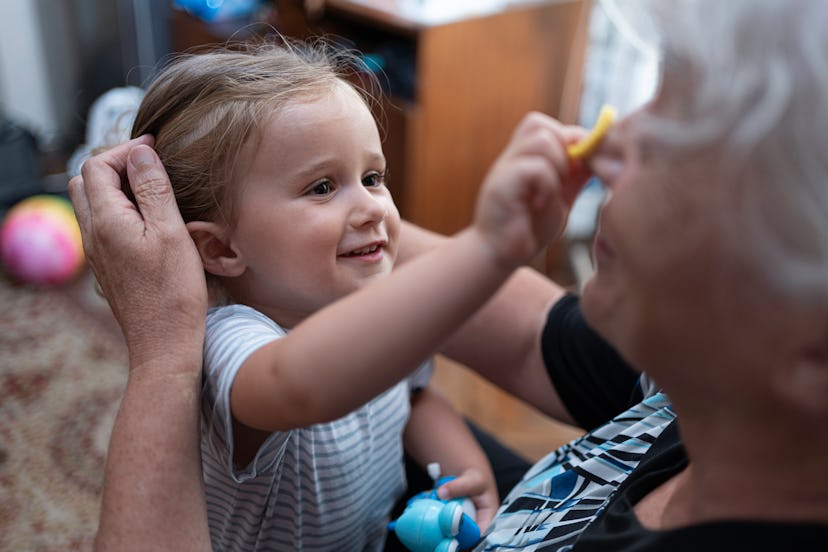 Multigenerational family get together at home. Sharing family moments and caring for each other.