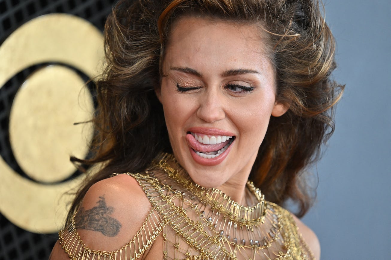 US singer-songwriter Miley Cyrus arrives for the 66th Annual Grammy Awards at the Crypto.com Arena i...