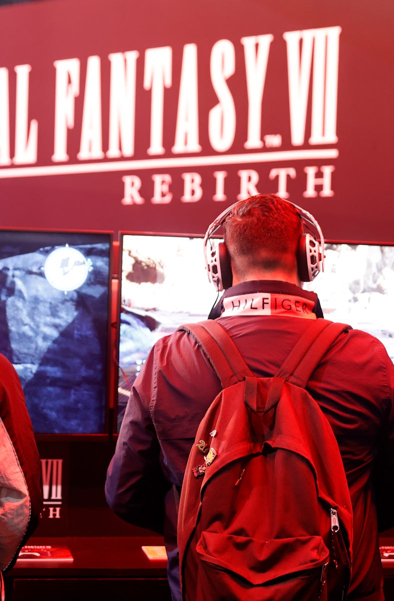 PARIS, FRANCE - OCTOBER 31: A gamer wearing a headphones plays the video game 'Final Fantasy VII Reb...