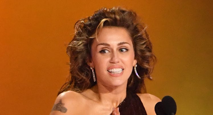 Miley Cyrus accepts the Record Of The Year award for "Flowers"