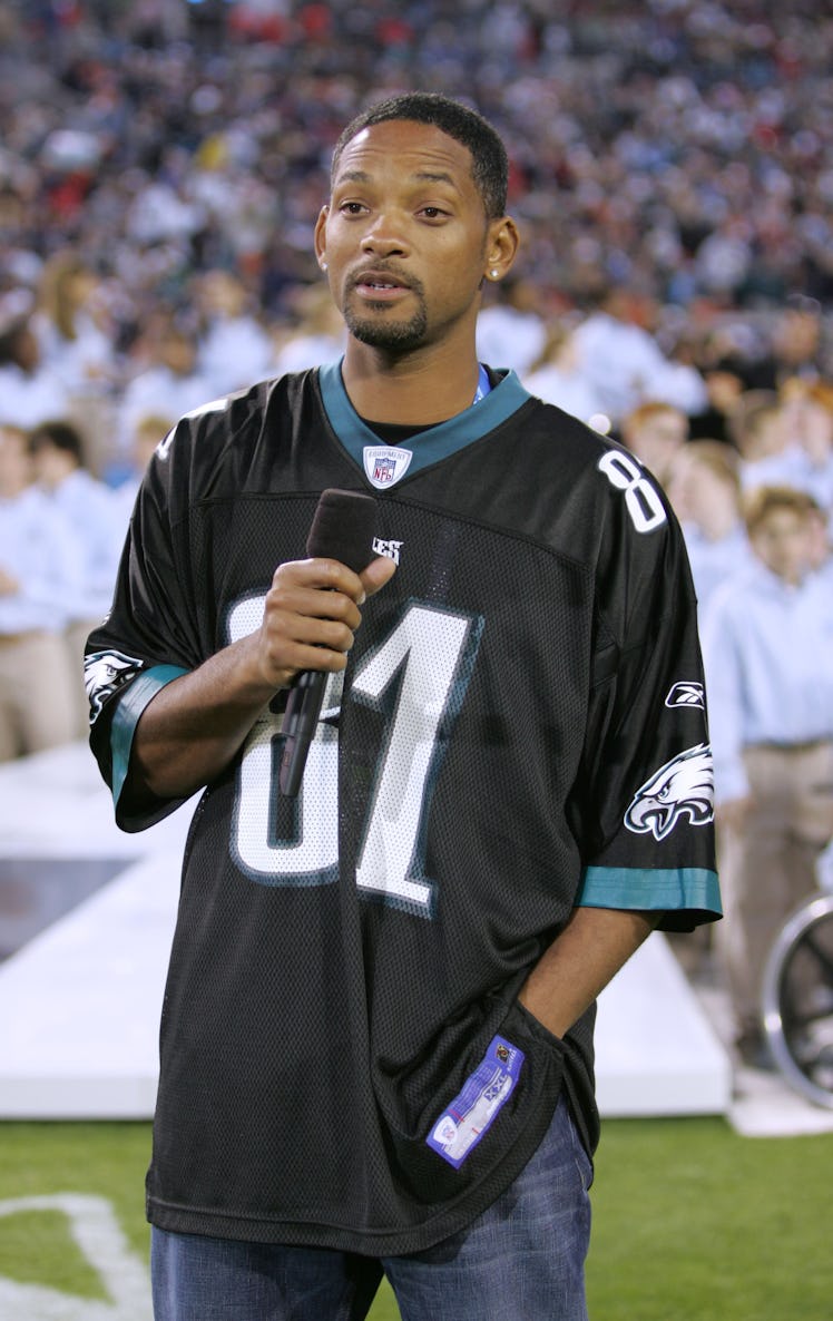 Actor Will Smith presents Alicia Keys during the XXXIX Superbowl pregame show at Alltel Stadium on F...