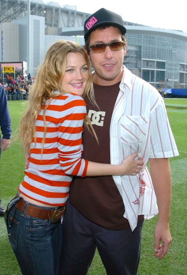 Drew Barrymore and Adam Sandler during MTV's "TRL" at Super Bowl XXXVIII at Reliant Stadium in Houst...