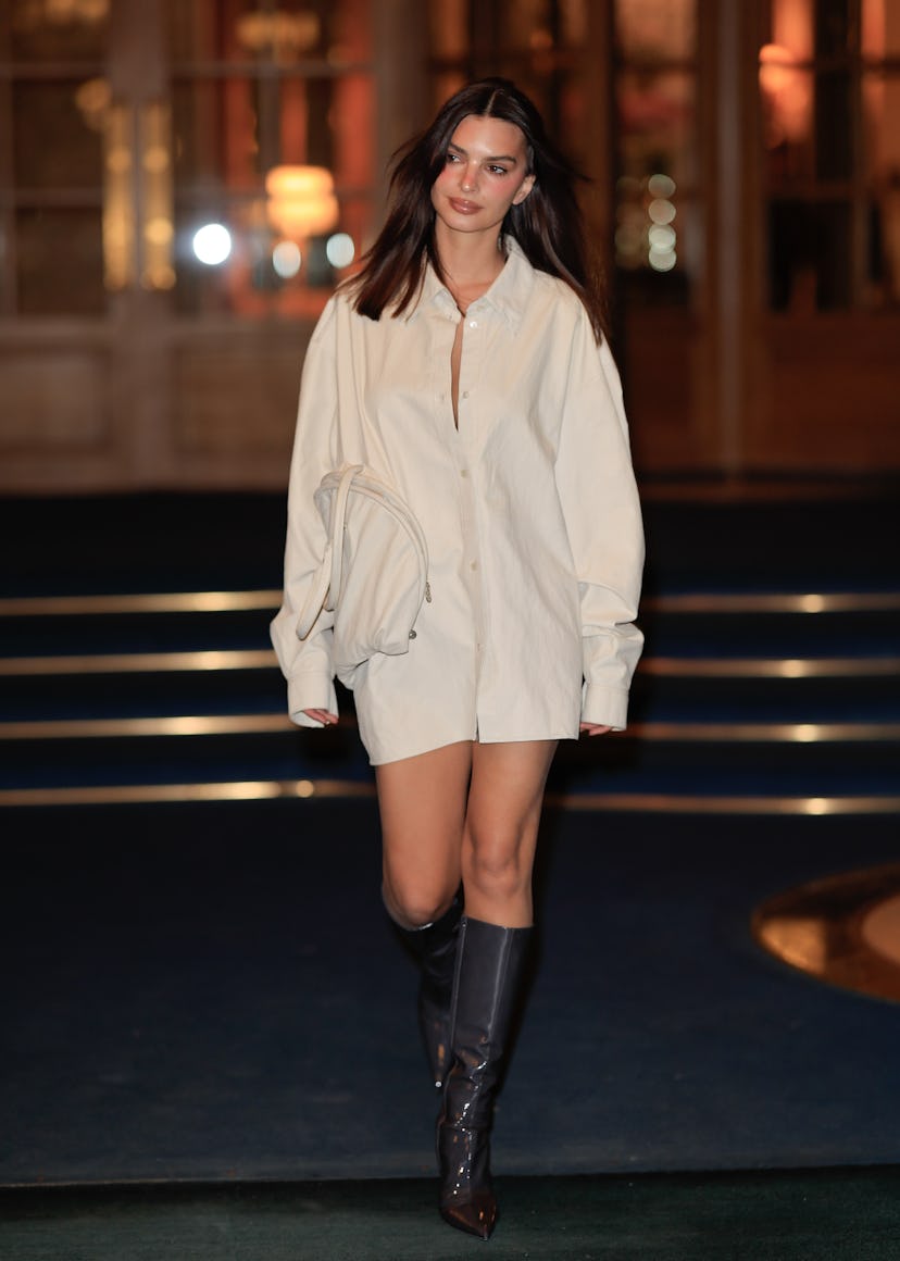 Emily Ratajkowski wears the Acne Studios bag dress at Paris Fashion Week Fall/Winter 2024