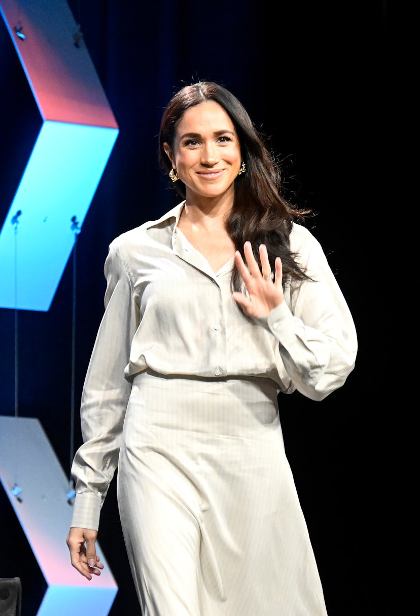 Meghan, Duchess of Sussex walks onstage during the Breaking Barriers, Shaping Narratives: How Women ...