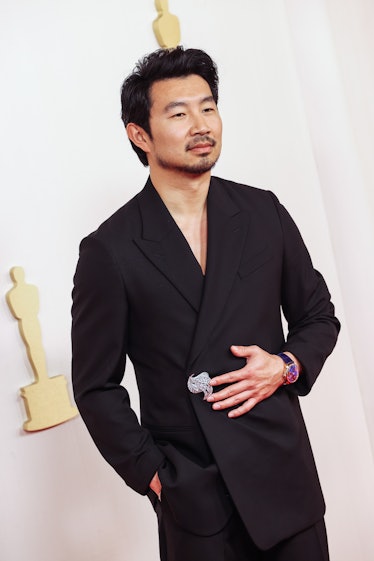 Simu Liu at the 96th Annual Oscars held at Ovation Hollywood on March 10, 2024 in Los Angeles, Calif...