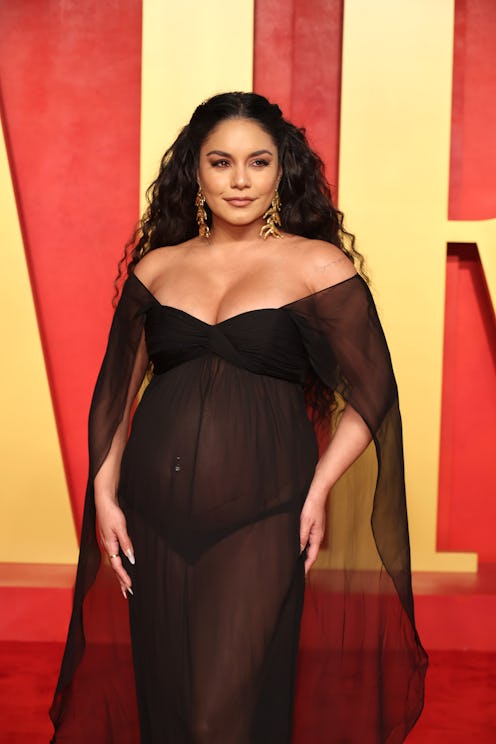 Vanessa Hudgens attends the 2024 Vanity Fair Oscar Party showing off her pregnancy baby bump in a sh...
