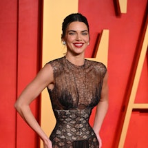 Kendall Jenner arrives at the 2024 Vanity Fair Oscar Party in a maison margiela naked dress with a f...