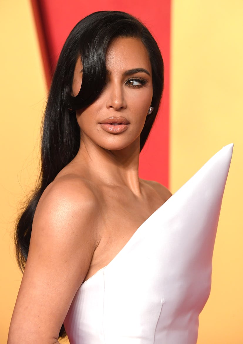 Kim Kardashian rocked cartoonish bangs at the 2024 Vanity Fair Oscar Party.