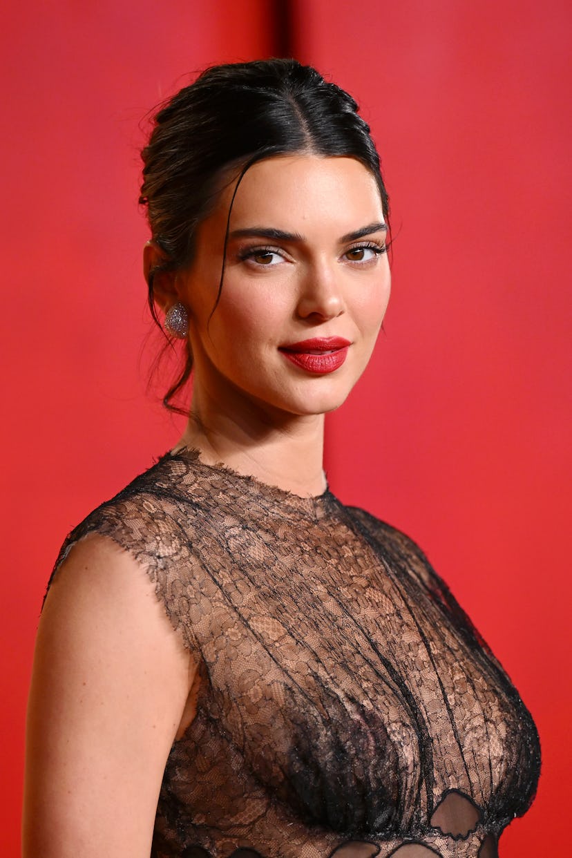 Kendall Jenner wore red lipstick at the 2024 Vanity Fair Oscar Party.
