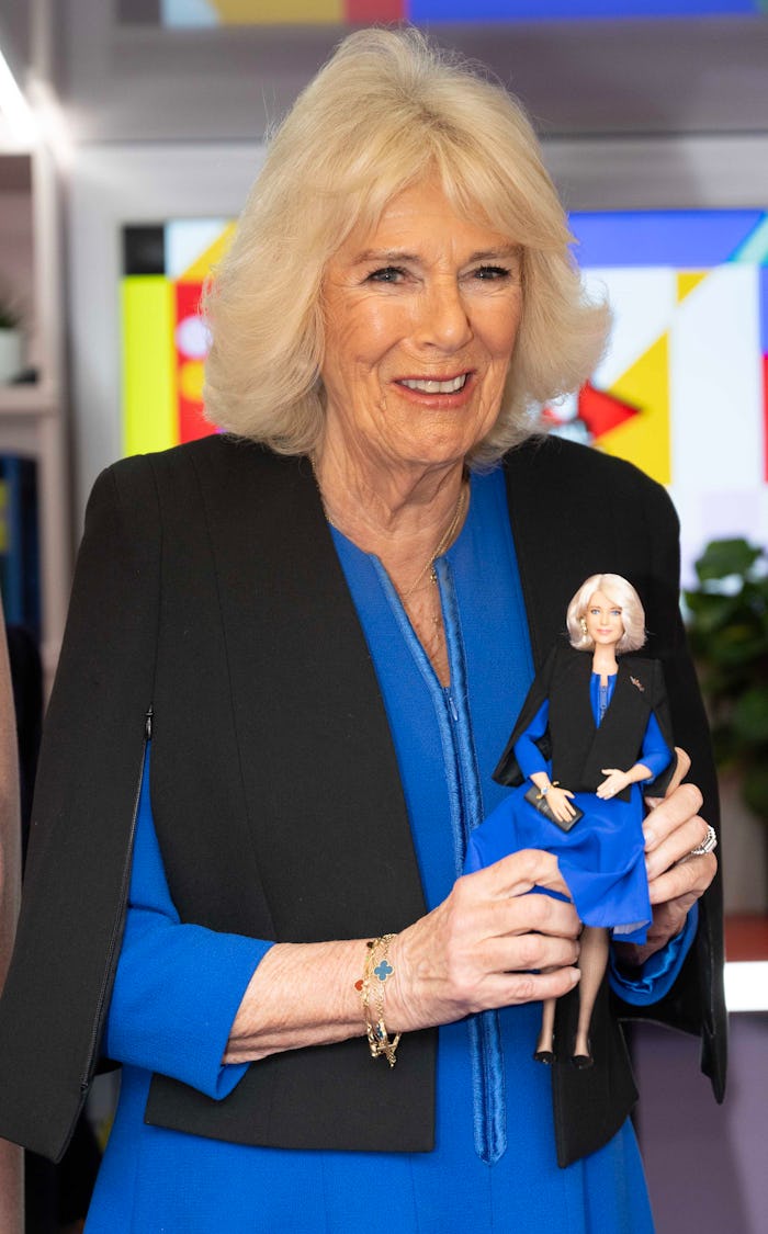 LONDON, ENGLAND - MARCH 12: Her Majesty, Queen Camilla is presented with a Barbie in her likeness at...
