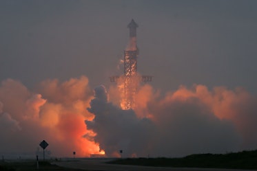BOCA CHICA, TEXAS - MARCH 14: The Starship spacecraft, atop the Super Heavy rocket, lifts off on a h...