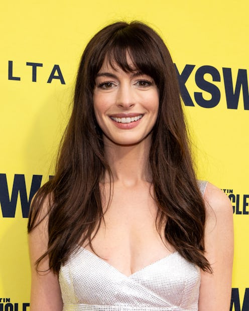 Anne Hathaway got teary over the crowd support at the world premiere of 'The Idea of You' during SXS...