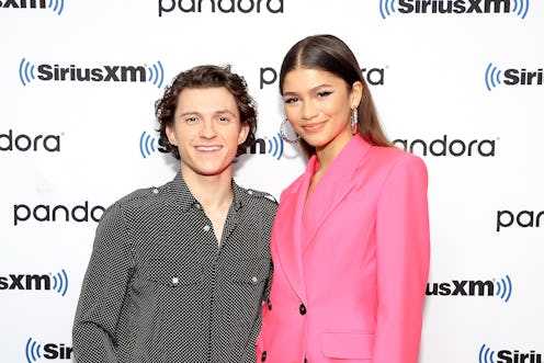 NEW YORK, NEW YORK - DECEMBER 10: Tom Holland and Zendaya attend SiriusXM's Town Hall with the cast ...