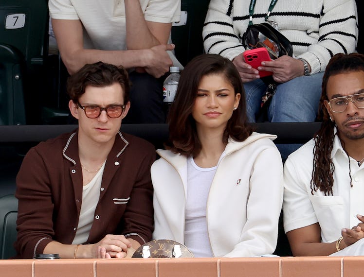 Tom Holland and Zendaya watches Carlos Alcaraz of Spain play Daniil Medvedev of Russia during the Me...