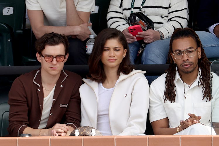 Tom Holland and Zendaya watches Carlos Alcaraz of Spain play Daniil Medvedev of Russia during the Me...