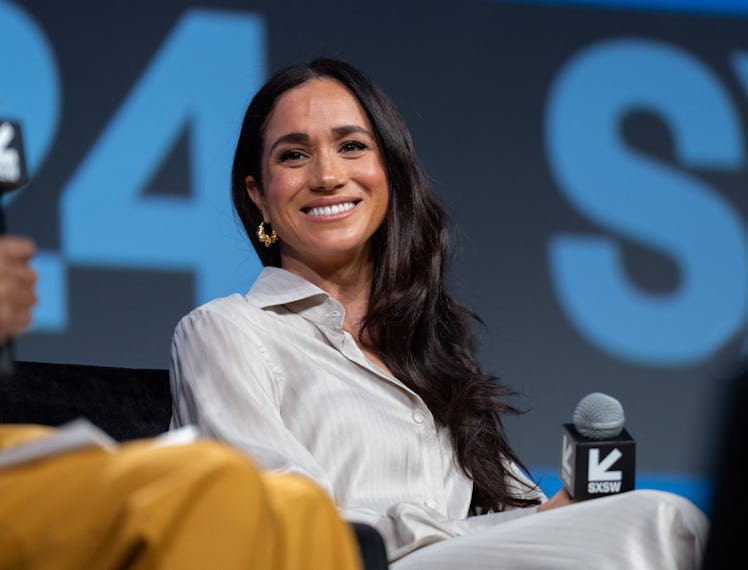 Britain's Meghan, Duchess of Sussex, attends the "Keynote: Breaking Barriers, Shaping Narratives: Ho...