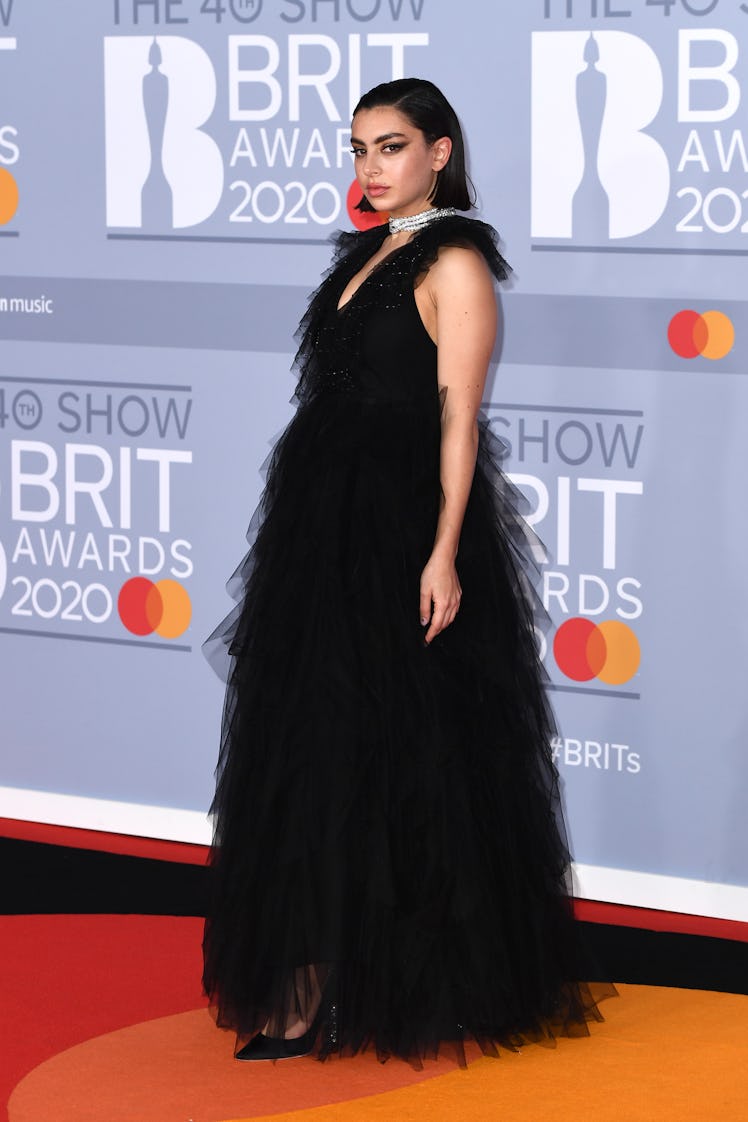 Charli XCX attends The BRIT Awards 2020 at The O2 Arena on February 18, 2020 in London, England.