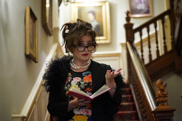 Helena Bonham Carter reading a poem at a Fall 2023 reception.