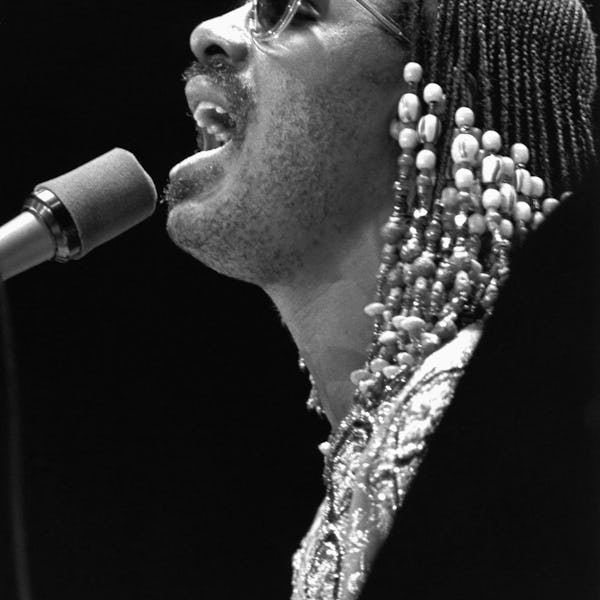 Stevie Wonder beads in braids 1989