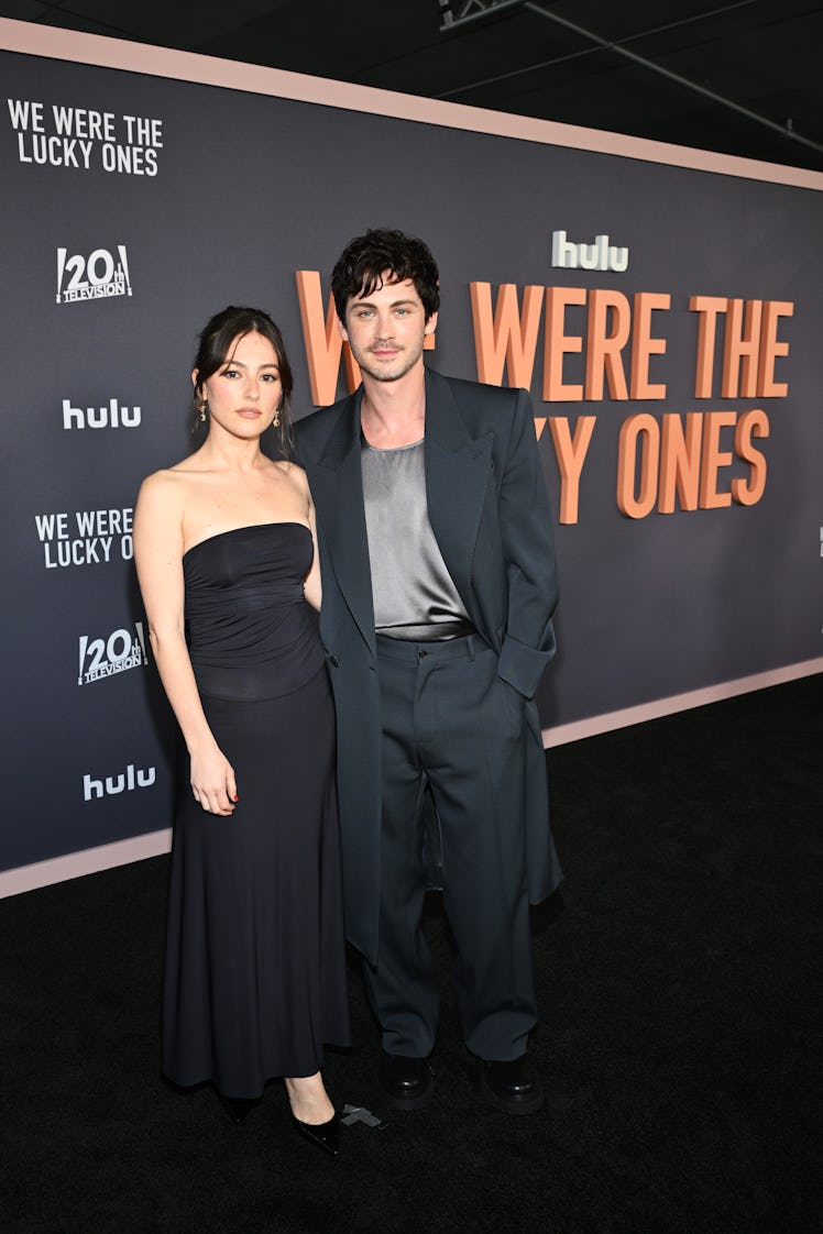 Ana Corrigan and Logan Lerman at the L.A. premiere of "We Were The Lucky Ones" held at The Academy M...
