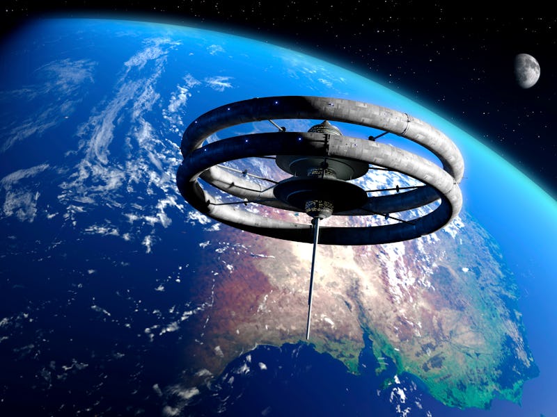 Space hotel. Artwork of a futuristic space hotel in Earth orbit. The structure is circular and spins...